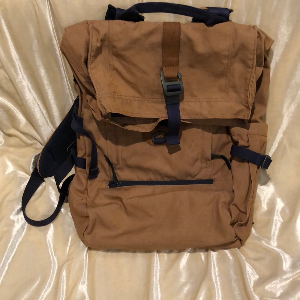This is a nice backpack with a small spot of discoloured fabric on the back.